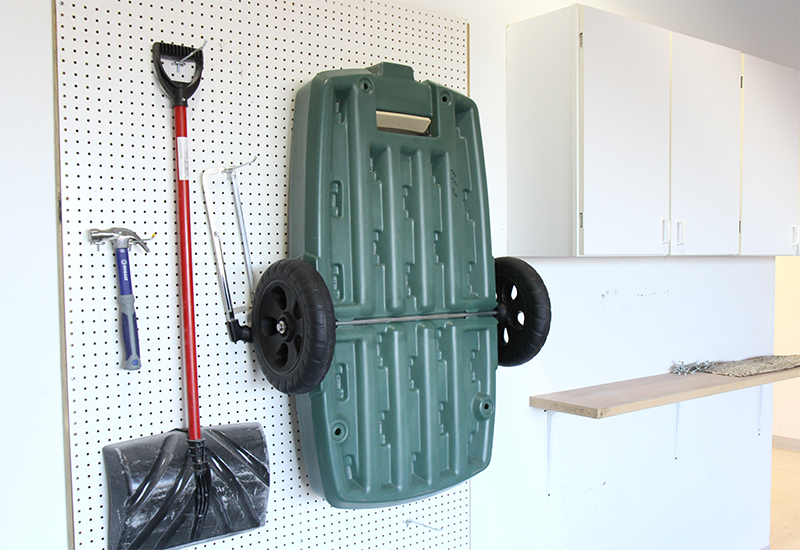 Easy Haul Flat Bed hanging on wall of garage