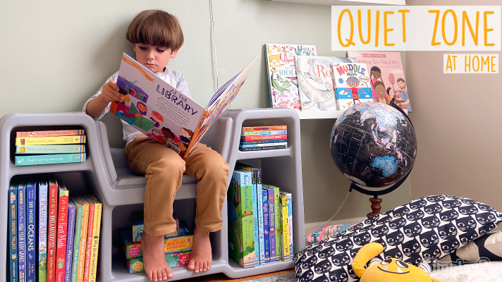 create an at-home quiet zone with simplay3 - child sits on a cozy cubby reading nook reading a story